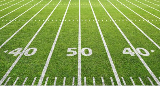 Green Football Field at Fifty Yard Line